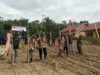 Bhabinkamtibmas Polsek Muara Kuang Hadiri Kegiatan Penanaman Jagung di Desa Sukananti