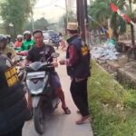 Peduli Kesehatan Warga, PAC Sako Forum Cakar Sriwijaya Bagikan Masker Gratis