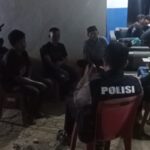 Kapolsek Muara Kuang Pimpin Patroli Dialogis ke Desa Tanjung Miring, Sampaikan Pesan Kamtibmas kepada Masyarakat