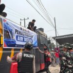 Kemarau Panjang, Polres OKI Bersama TNI dan BPBD Salurkan Air Bersih untuk Warga Jua-Jua dan sidakersa